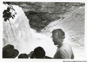 ["Governor Rockefeller standing on an overlook at Blackwater Falls."]%